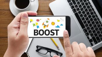 salesperson holding phone boosting sales