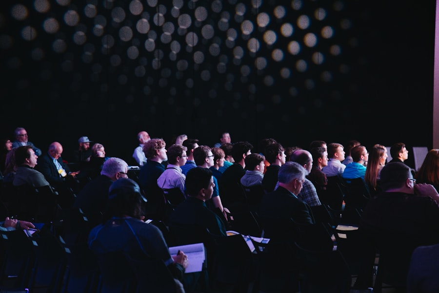 Executive speaking at a conference podium in front of an audience