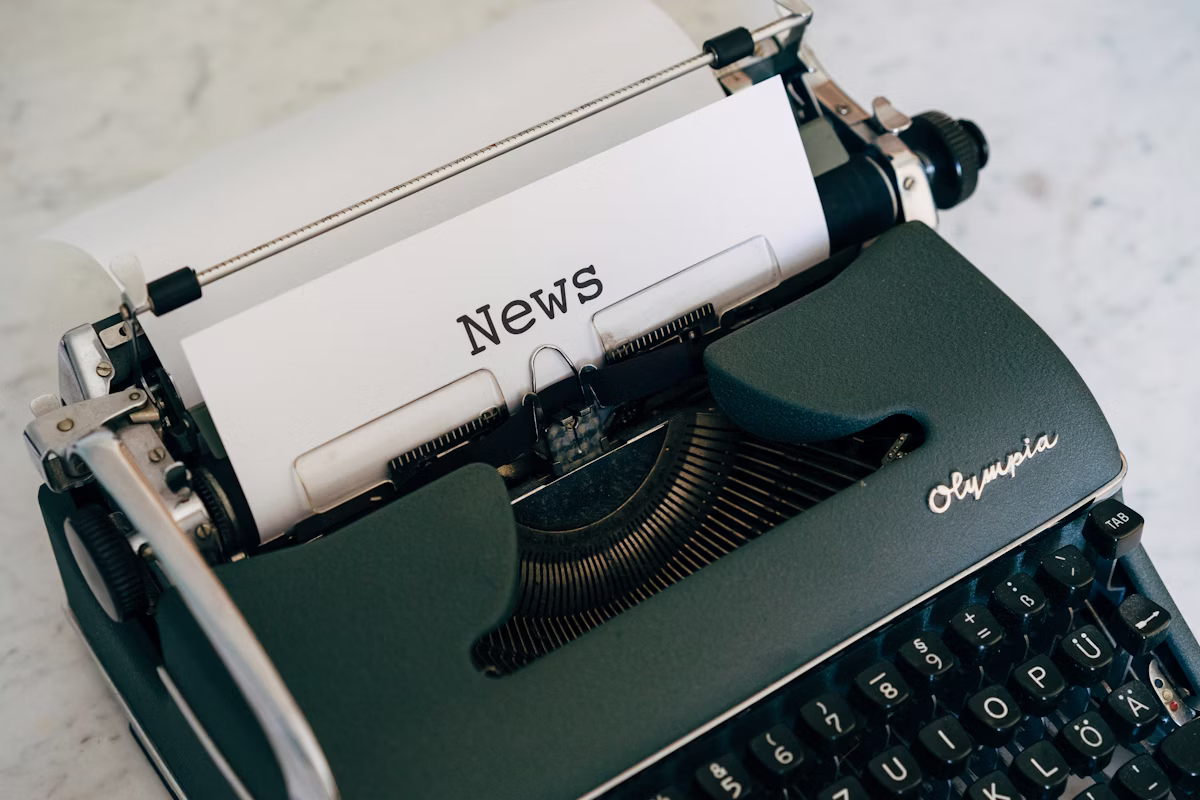 Typewriter with a news page, representing crisis communications and media management