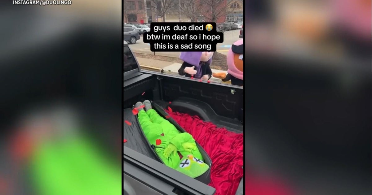 Duolingo's green owl mascot Duo appearing in a dramatic TikTok scene from the Death of Duo storyline